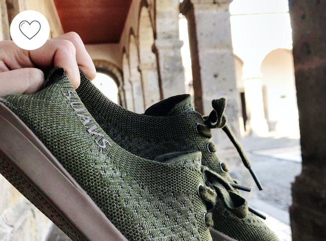 Image of someone holding a pair of SUAVS in their hand.